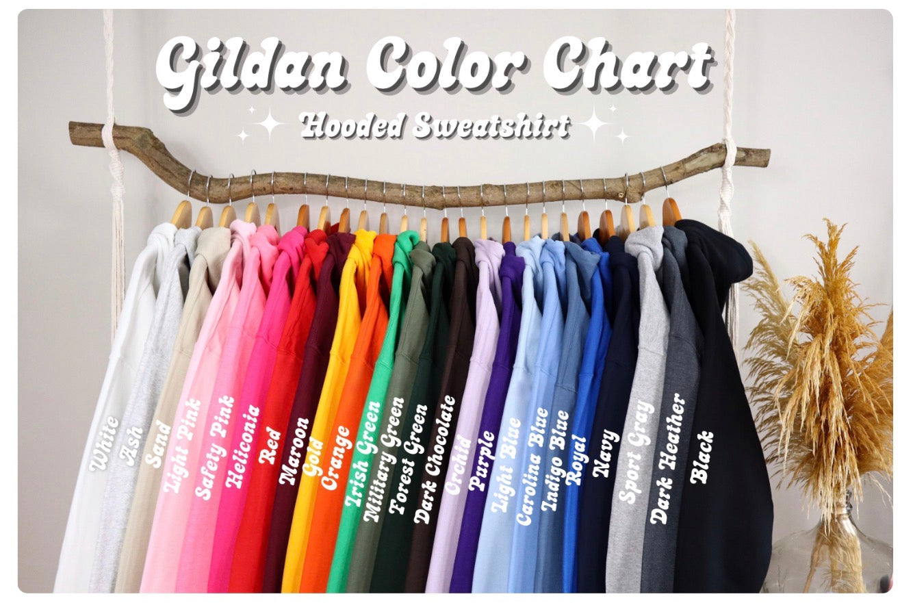 Gildan color chart for hooded sweatshirts displayed on a wooden rack.