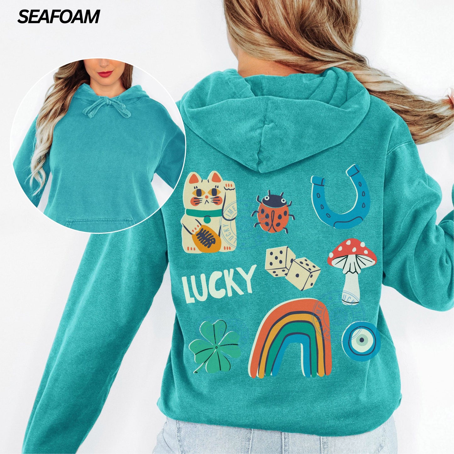 Teal hoodie with lucky charm designs on a white background