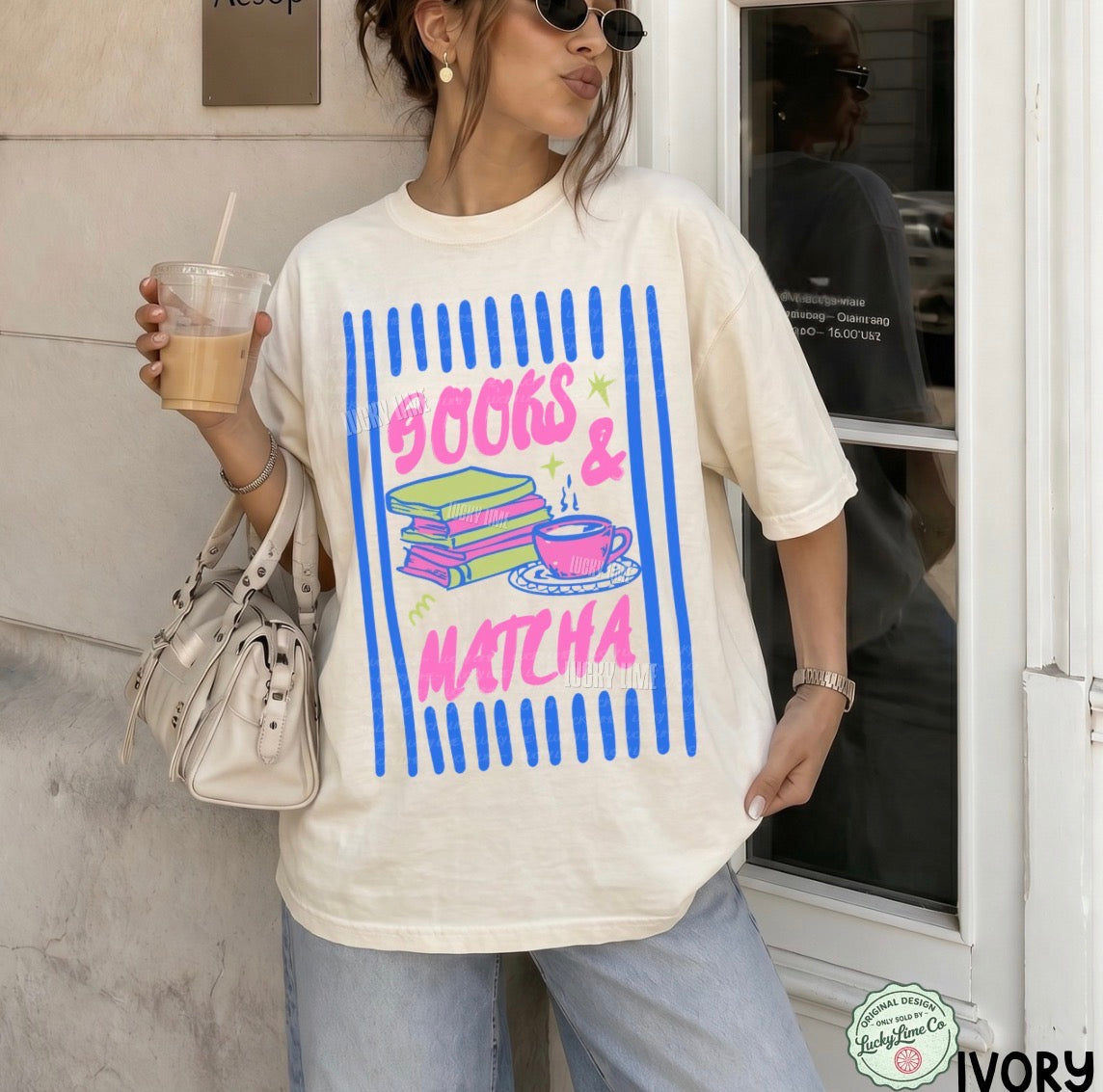 Woman wearing a t-shirt with 'Books & Matcha' design, holding a drink.