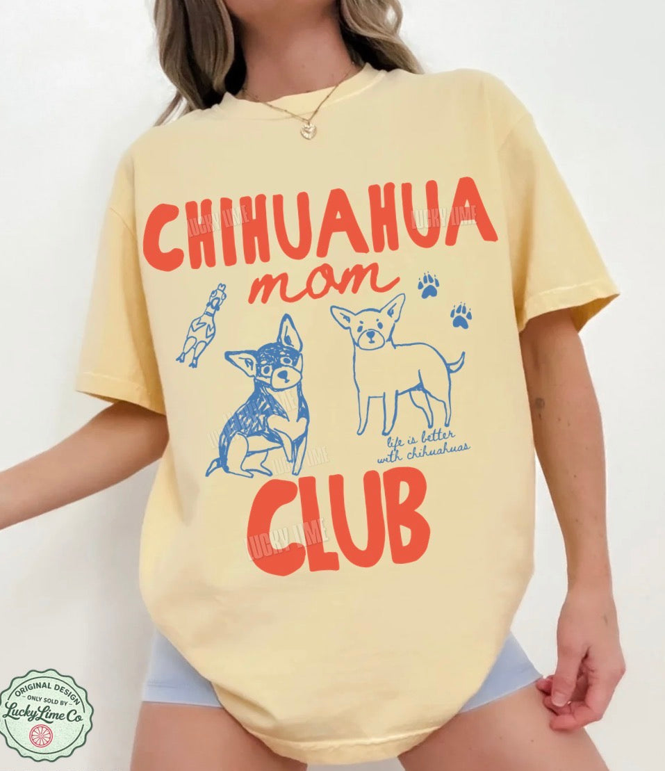 Person wearing a yellow t-shirt with 'Chihuahua mom club' text and graphics on a white background