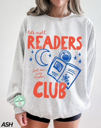 Gray sweatshirt with 'Late Night Readers Club' text and graphics on a plain background