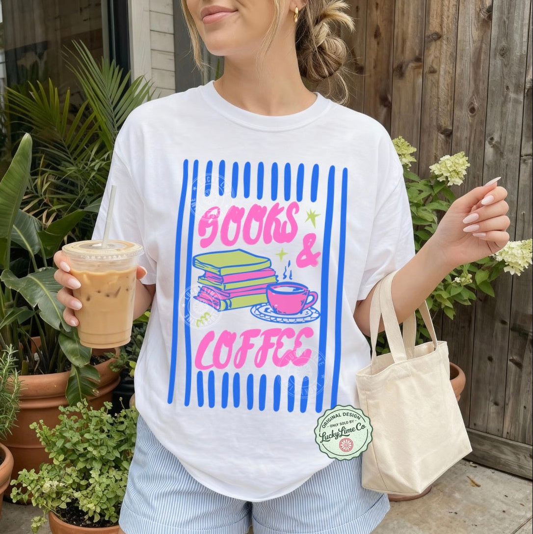 Person wearing a 'Books & Coffee' t-shirt holding iced coffee outdoors.
