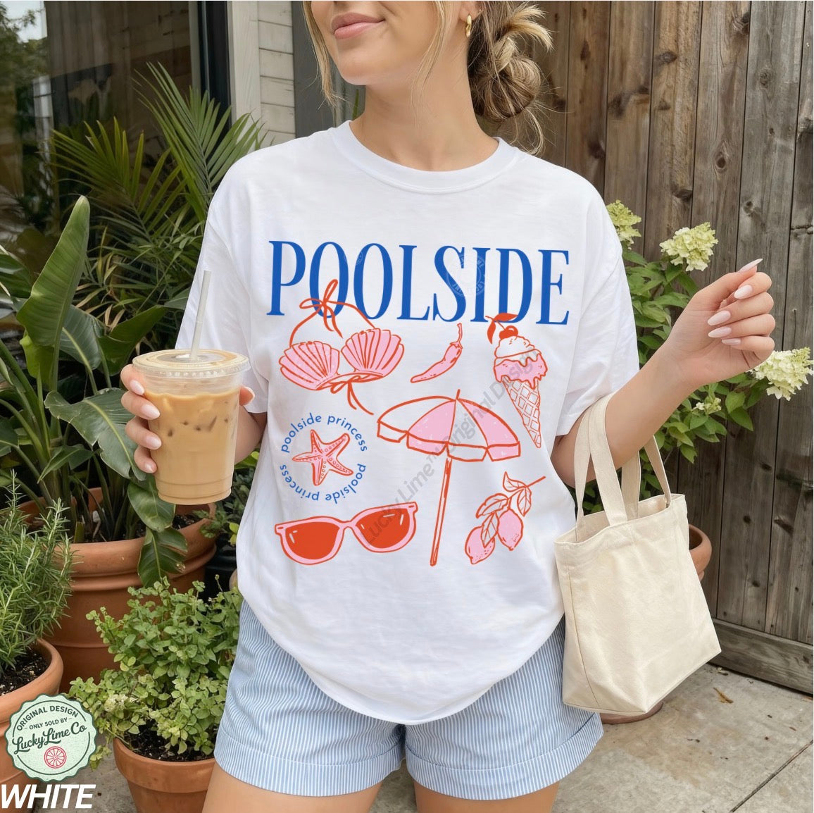 Person wearing a 'Poolside' themed t-shirt with graphics, holding a drink and a bag, standing outdoors.