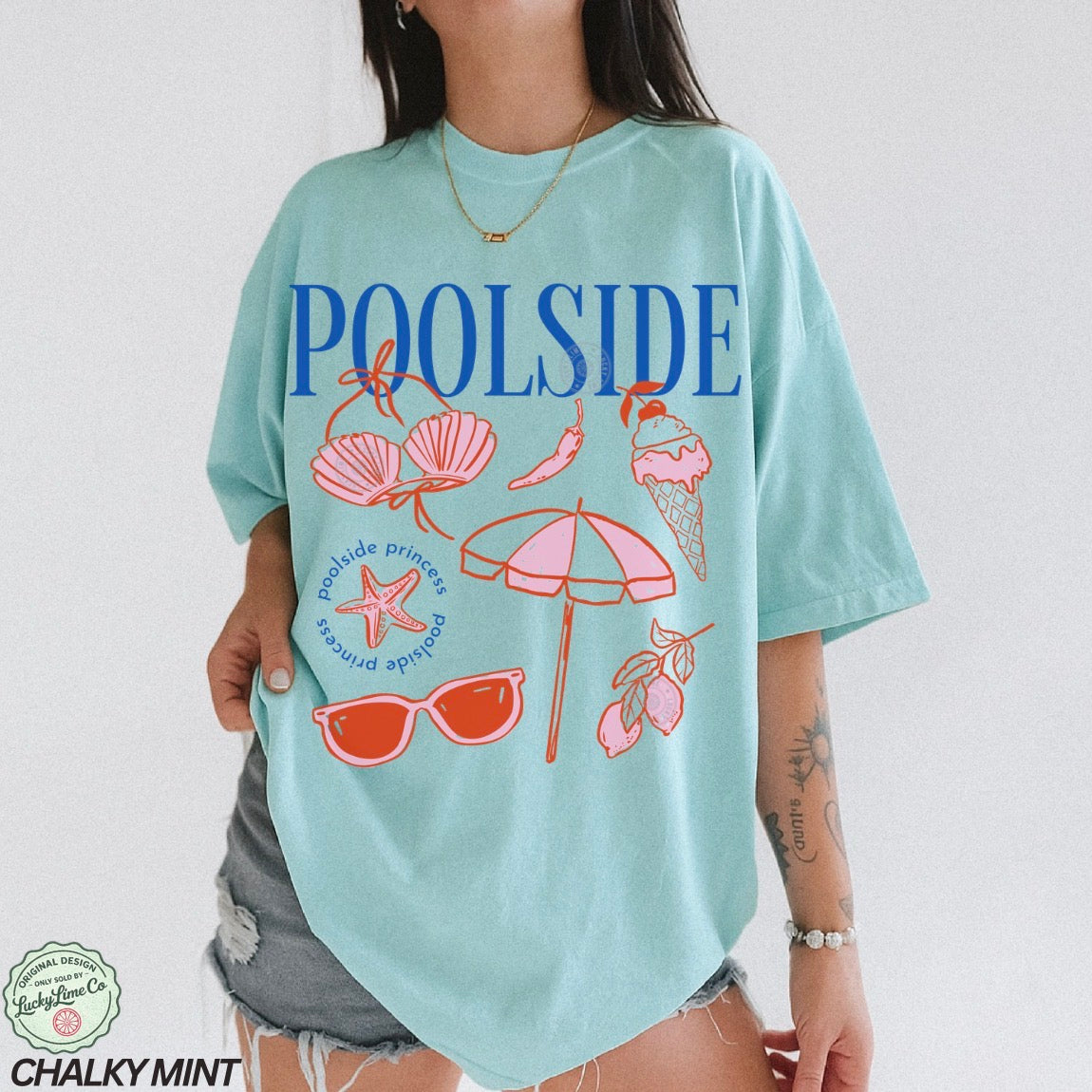 Person wearing a light blue t-shirt with 'Poolside' design and text.