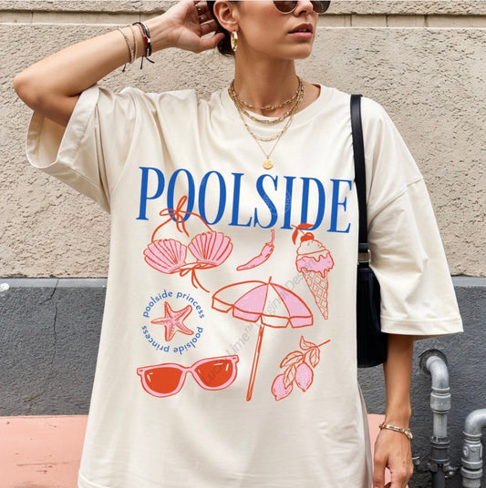 Person wearing a 'Poolside' themed t-shirt with beach graphics against a concrete wall.