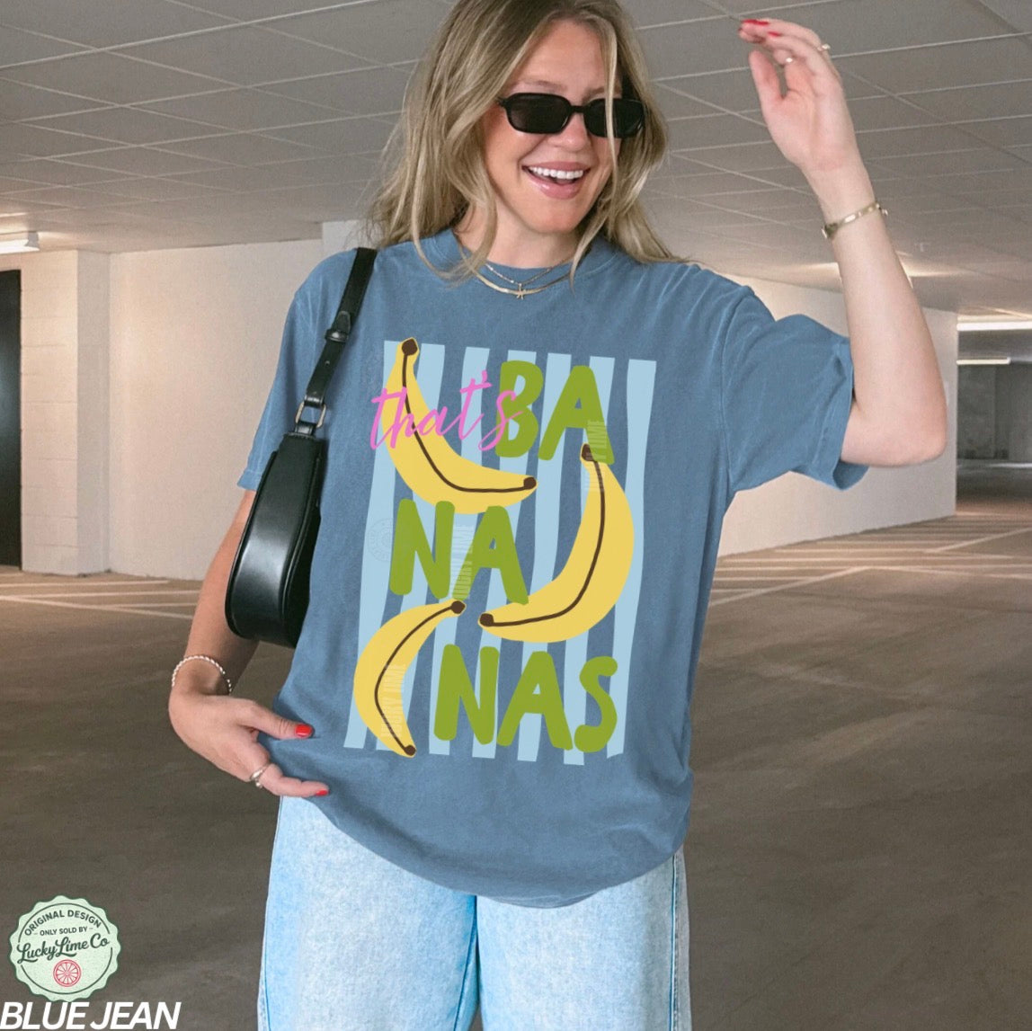 Girl wearing a blue shirt that says “that’s bananas”
