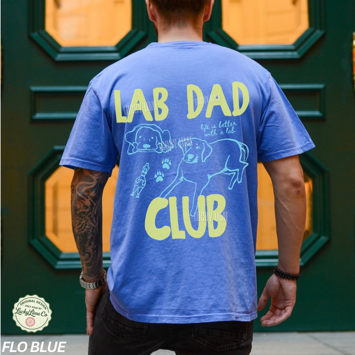 Person wearing a blue t-shirt with 'Lab Dad Club' text and graphics.