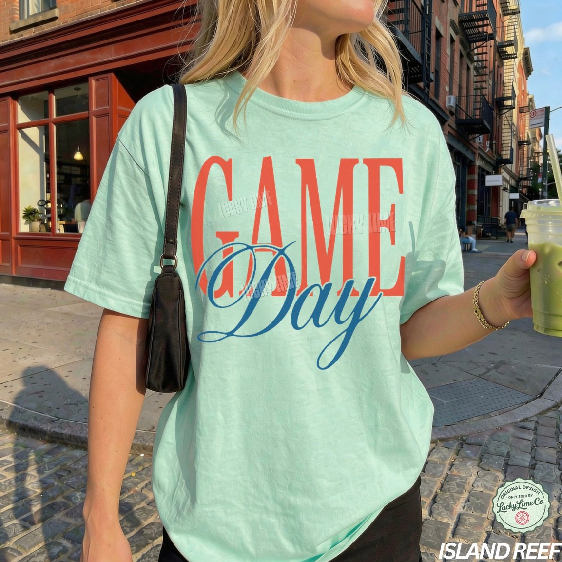 Person wearing a 'Game Day' t-shirt on a city street