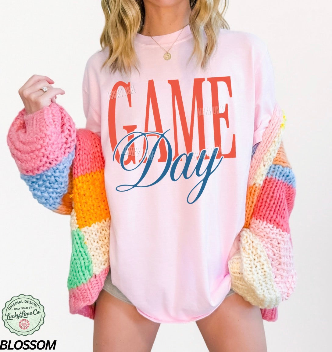 Person wearing a colorful sweater with 'GAME DAY' text on a white background