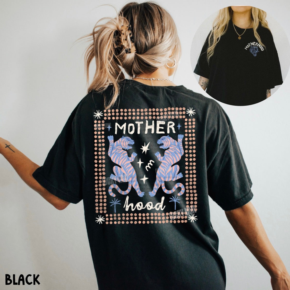 Black t-shirt with 'MOTHERHOOD' design featuring two wolves and the word 'Motherhood'.