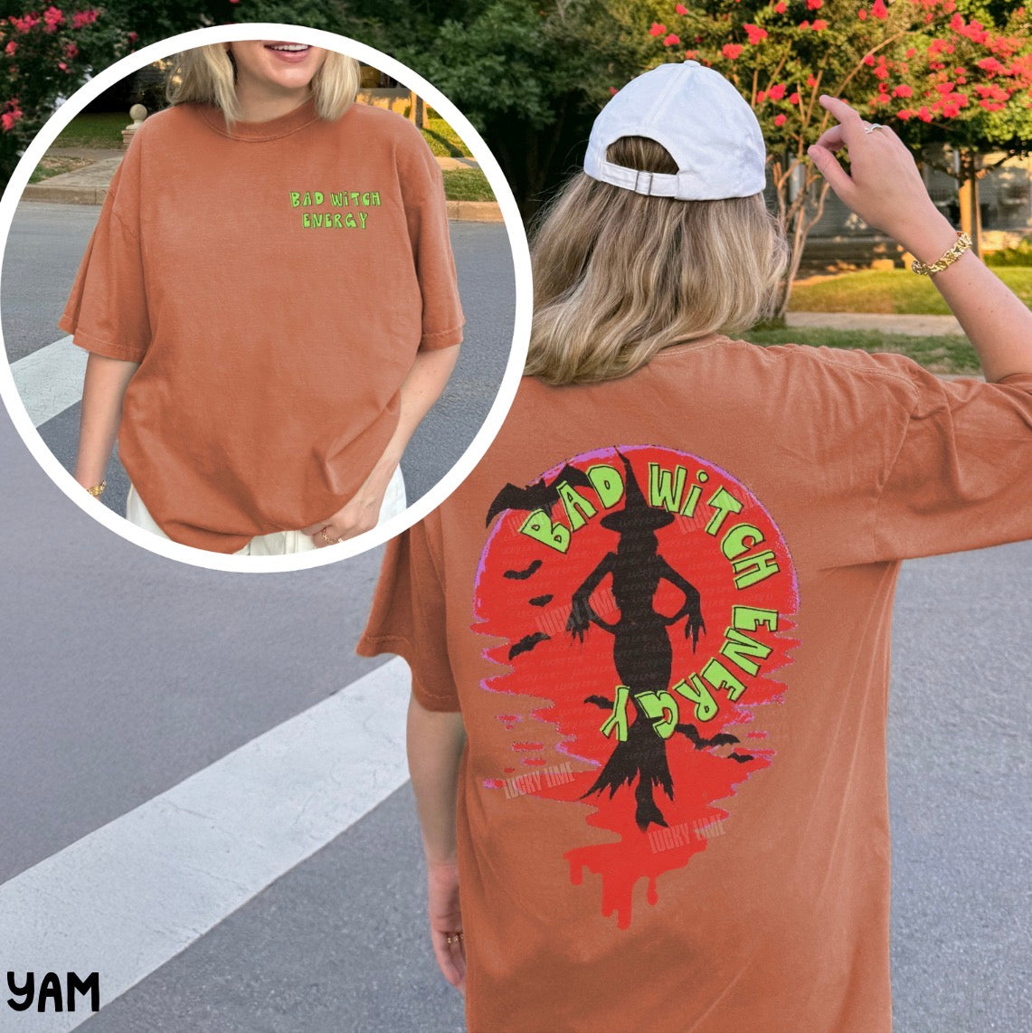 Person wearing a yam t-shirt with 'Bad Witch Energy' design outdoors.