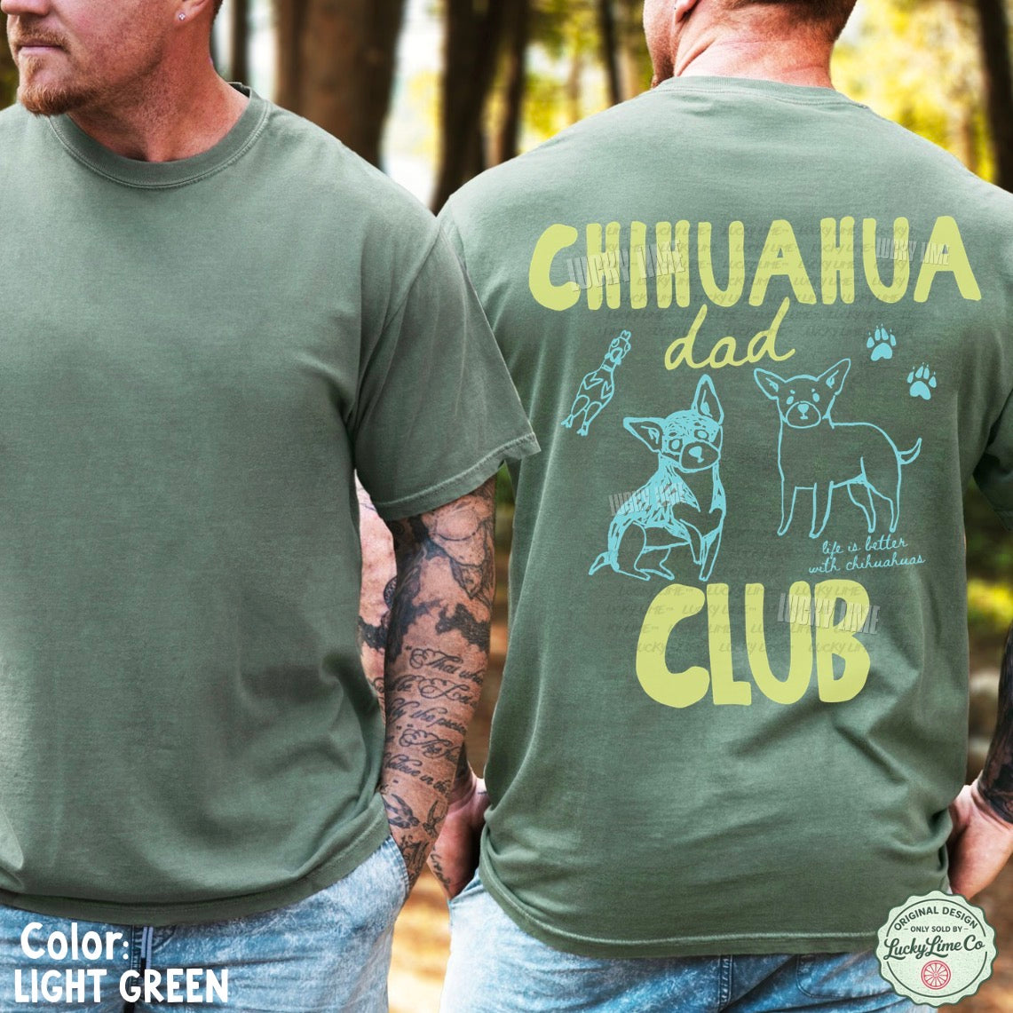 Two men wearing light green t-shirts, one plain and one with 'Chihuahua dad club' design.