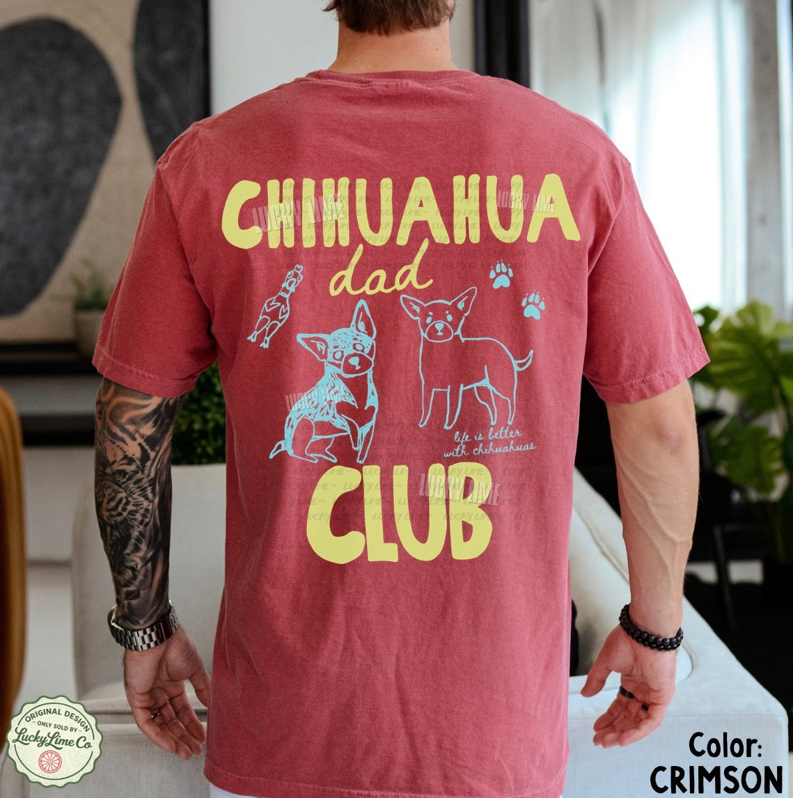 Person wearing a red t-shirt with 'Chihuahua Dad Club' text and graphics.