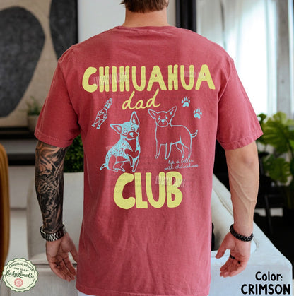 Person wearing a red t-shirt with 'Chihuahua Dad Club' text and graphics.