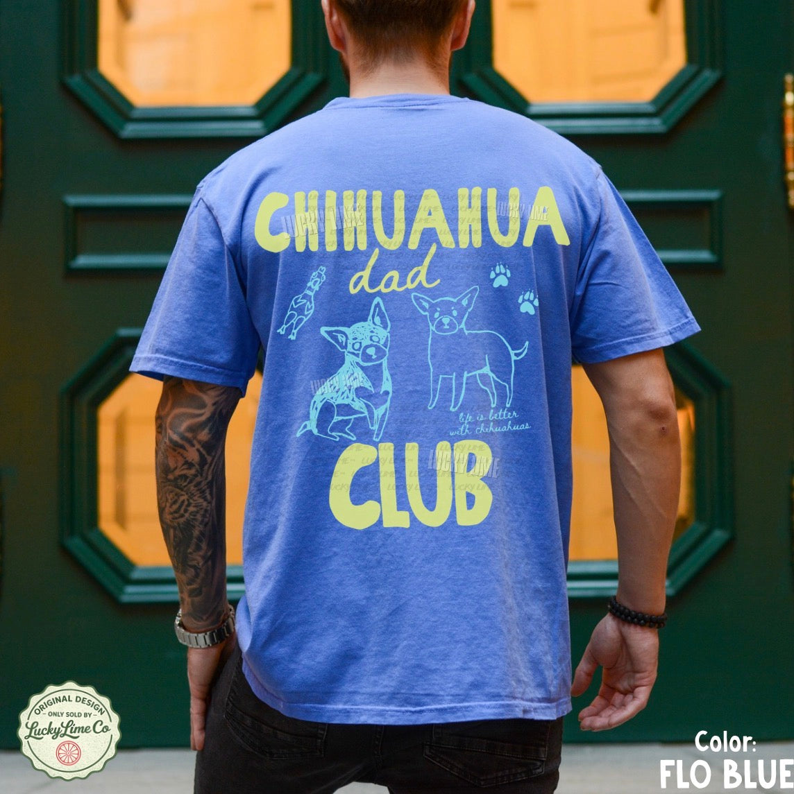 Person wearing a blue t-shirt with 'Chihuahua Dad Club' text and graphics.