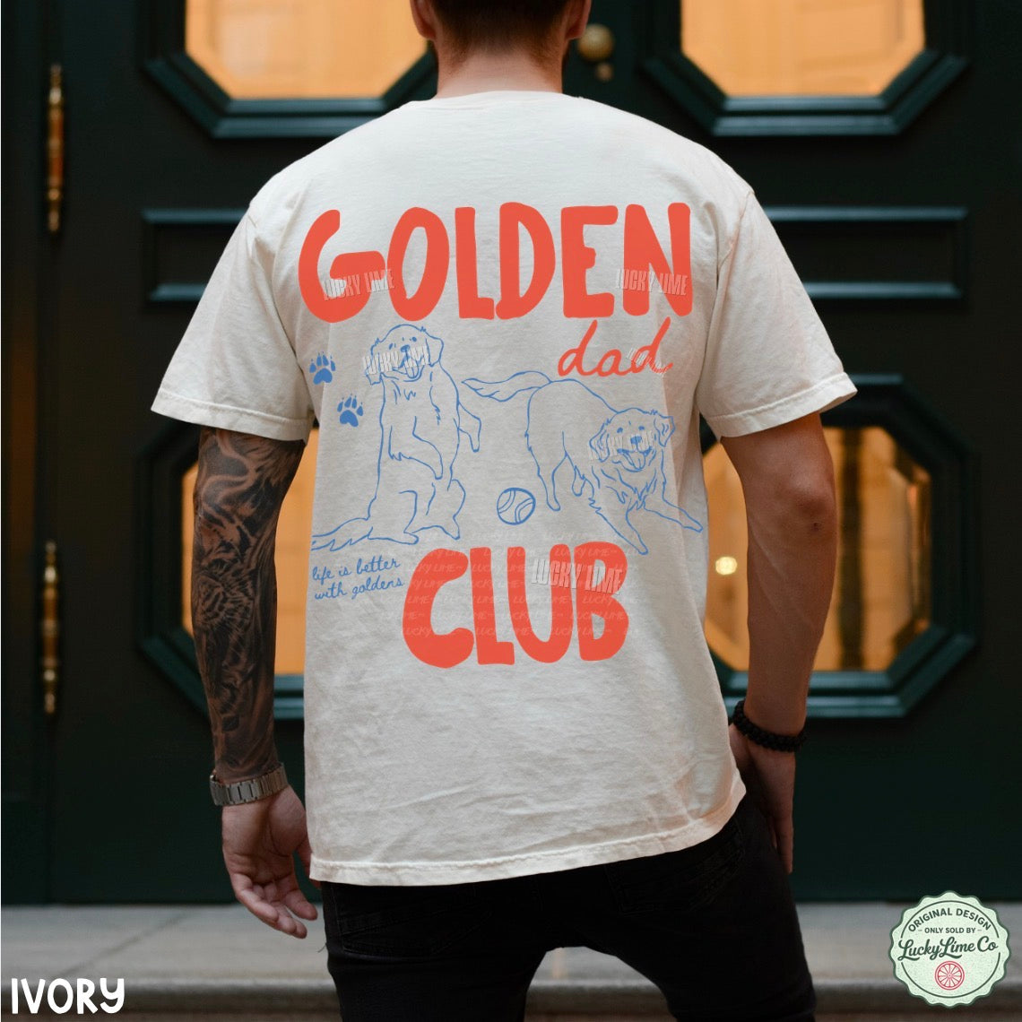 Person wearing a t-shirt with 'Golden Dad Club' design in front of a dark door.