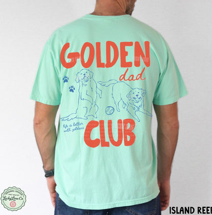 Person wearing a light green t-shirt with 'Golden Dad Club' text and graphics on the back.