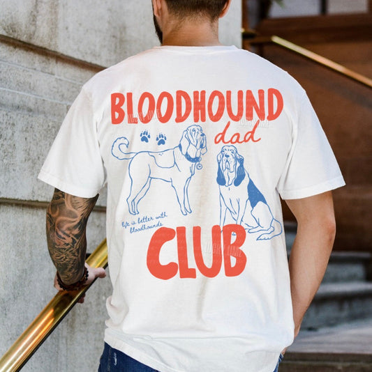 Person wearing a white t-shirt with 'Bloodhound Dad Club' design on the back.
