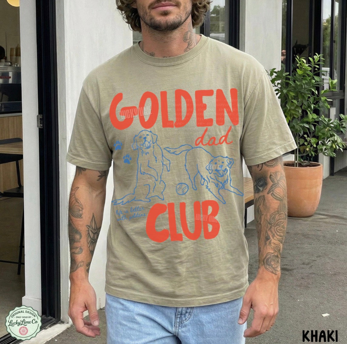 Man wearing a khaki t-shirt with 'Golden Dad Club' text and graphics.