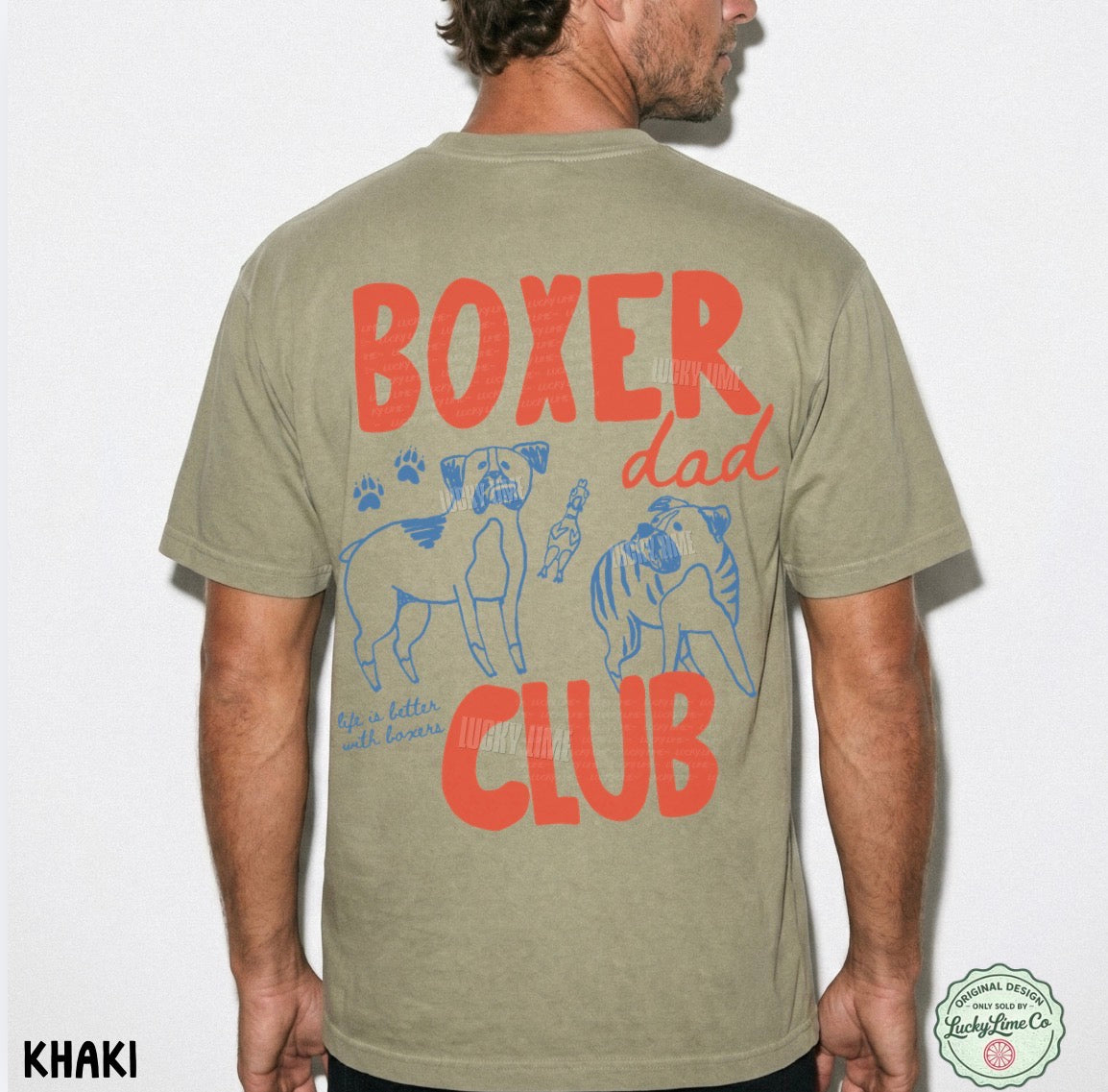 Khaki t-shirt with 'Boxer Dad Club' text and graphics on the back, worn by a person.