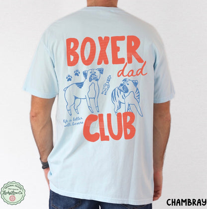Light blue t-shirt with 'Boxer Dad Club' text and graphics on the back, worn by a person.