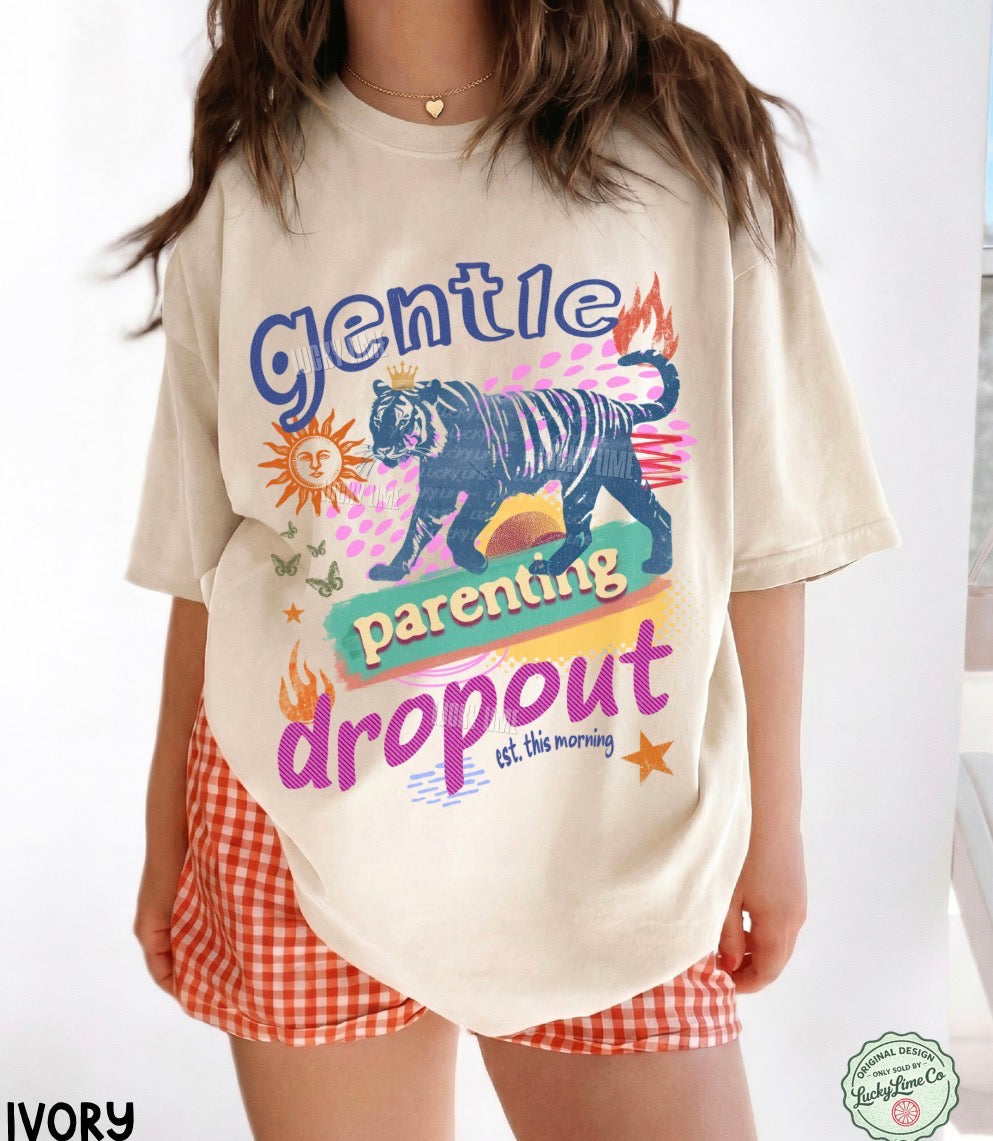 Person wearing a t-shirt with a graphic design and text, standing against a white background.