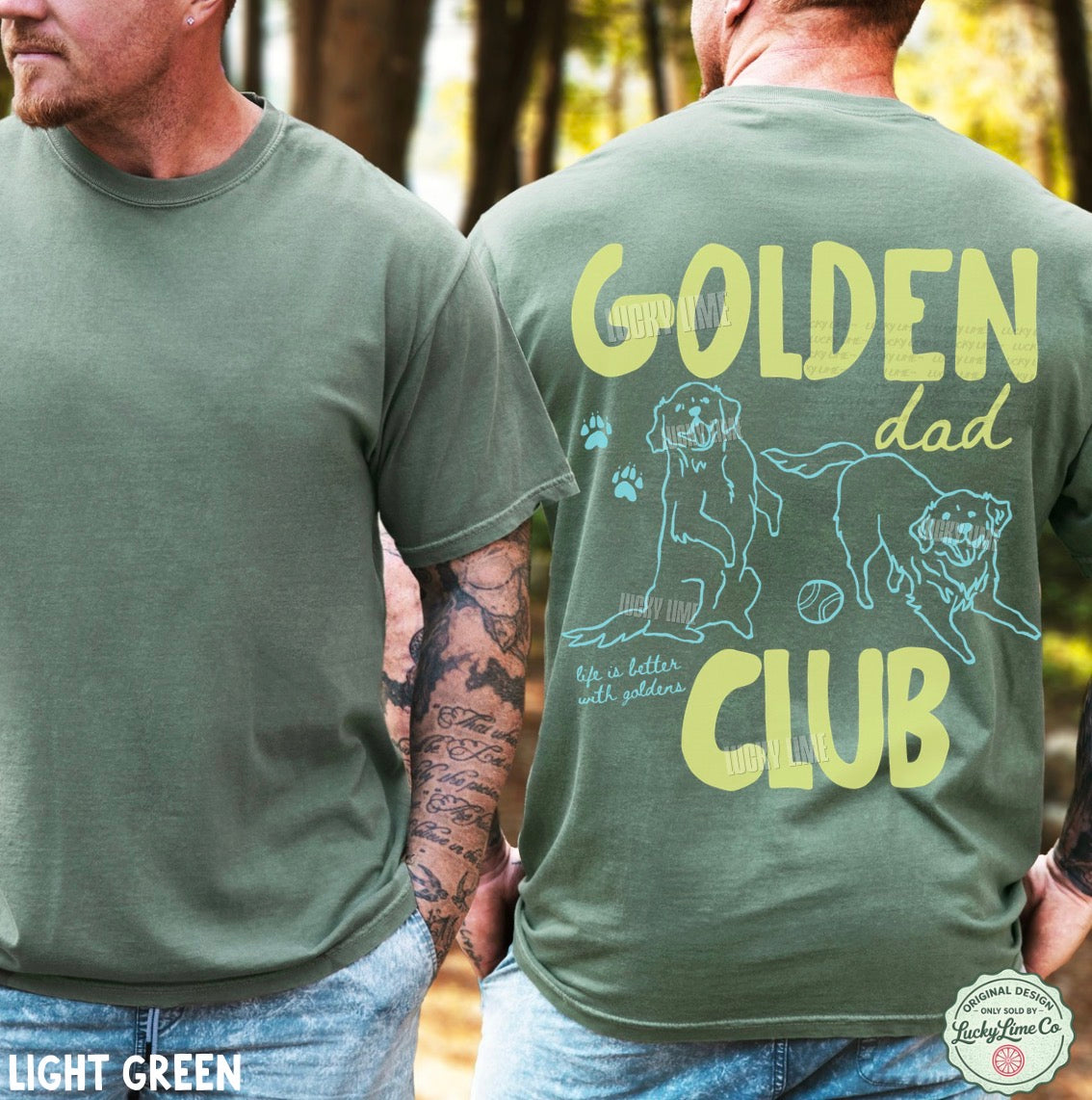 Two men wearing light green t-shirts with 'GOLDEN dad CLUB' text and dog illustrations in a forest setting.