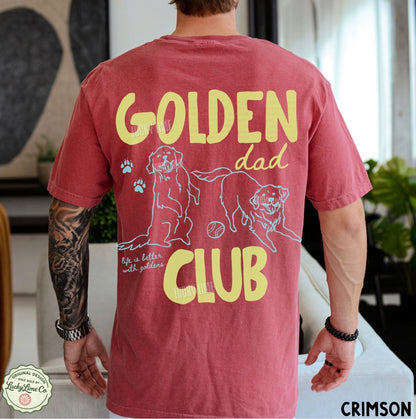 Person wearing a red t-shirt with 'Golden Dad Club' text and graphics.
