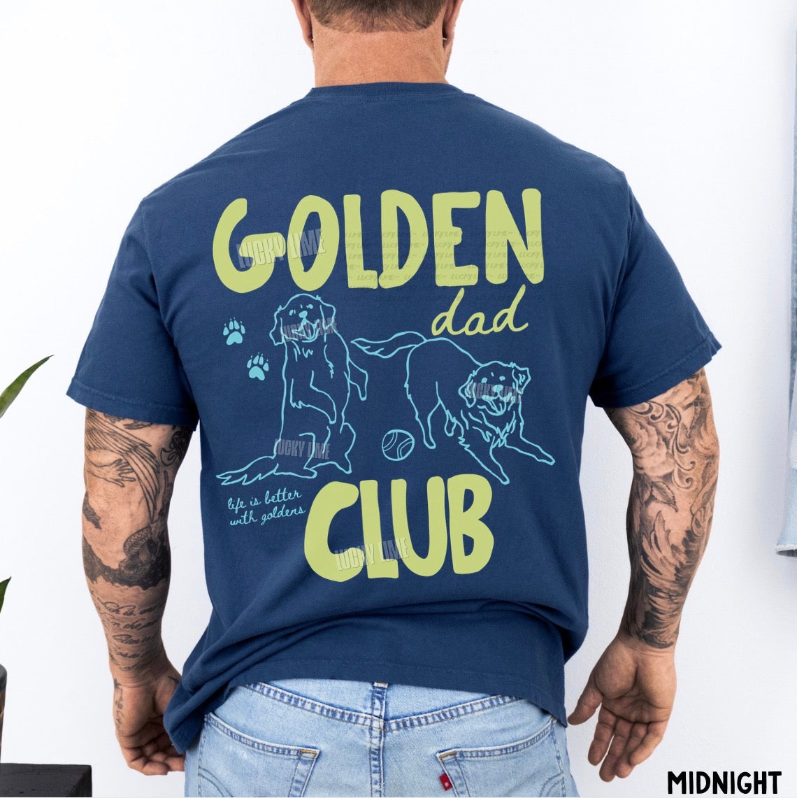 Person wearing a navy blue t-shirt with 'Golden Dad Club' text and graphics on the back.
