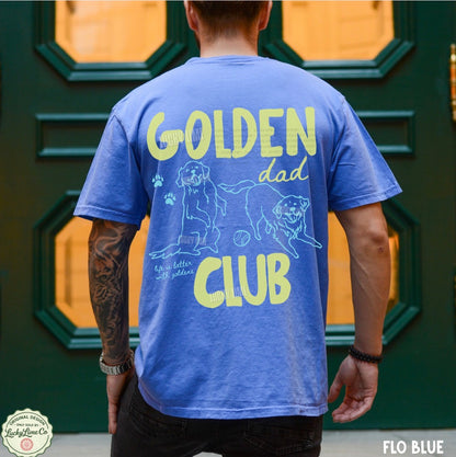 Person wearing a blue t-shirt with 'Golden Dad Club' text and graphics.