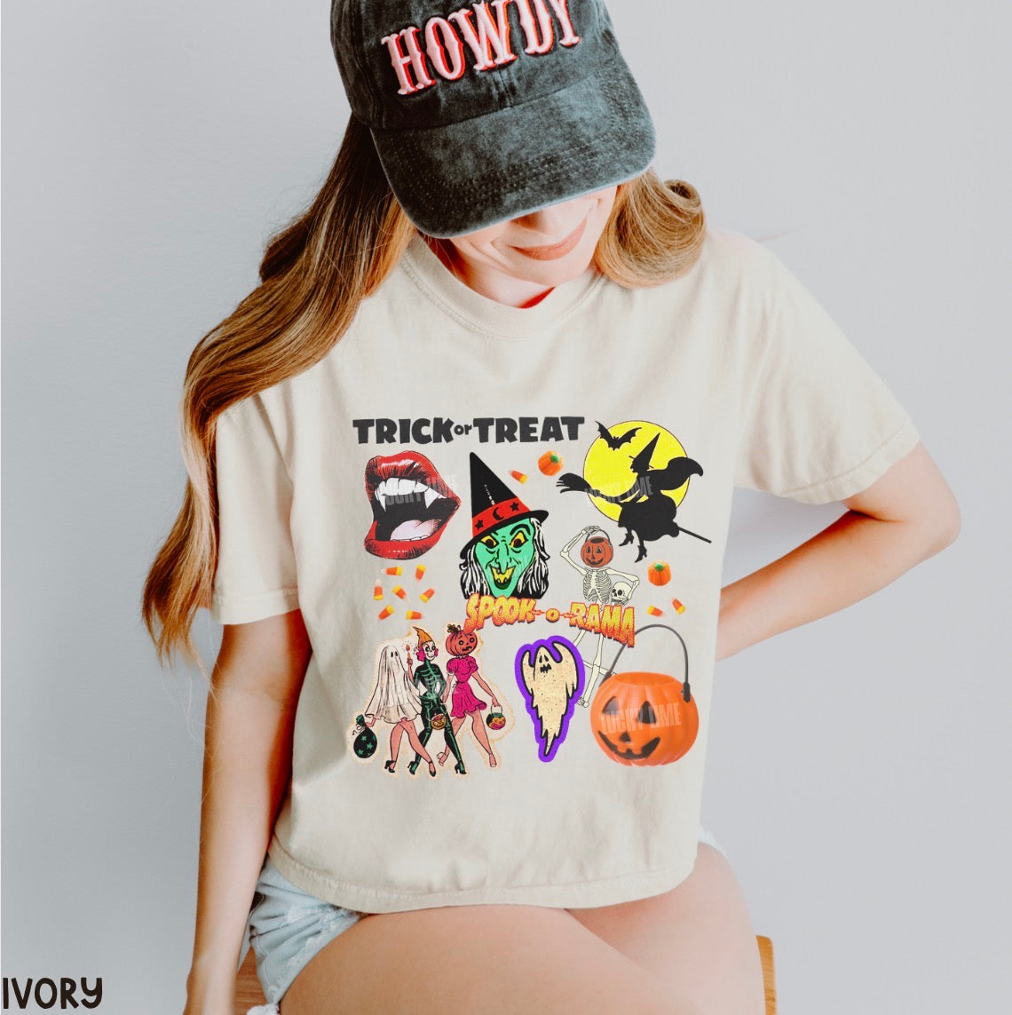 Person wearing a Halloween-themed t-shirt and cap with 'HOWDY' text.