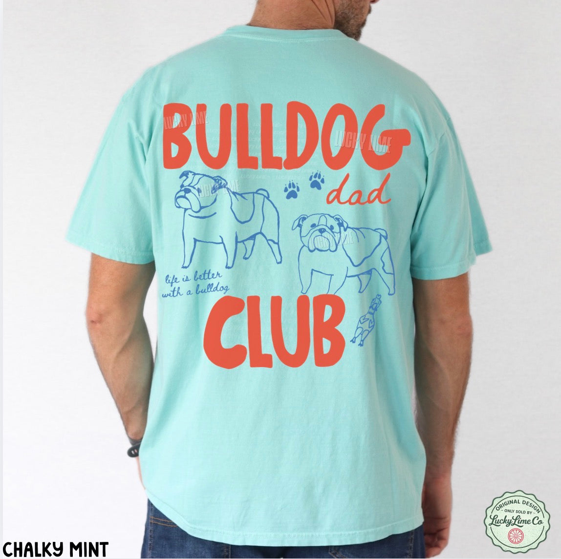 Light blue t-shirt with 'Bulldog Dad Club' text and graphics on a white background