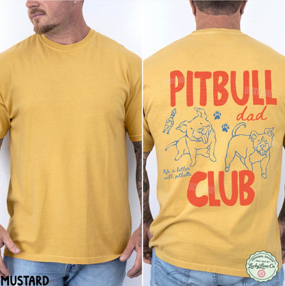 A man modeling a mustard yellow t-shirt, showing both the front and back views. The back of the shirt features a graphic print with the words 'PITBULL dad CLUB' in red and blue, along with illustrations of two pitbull dogs and paw prints.