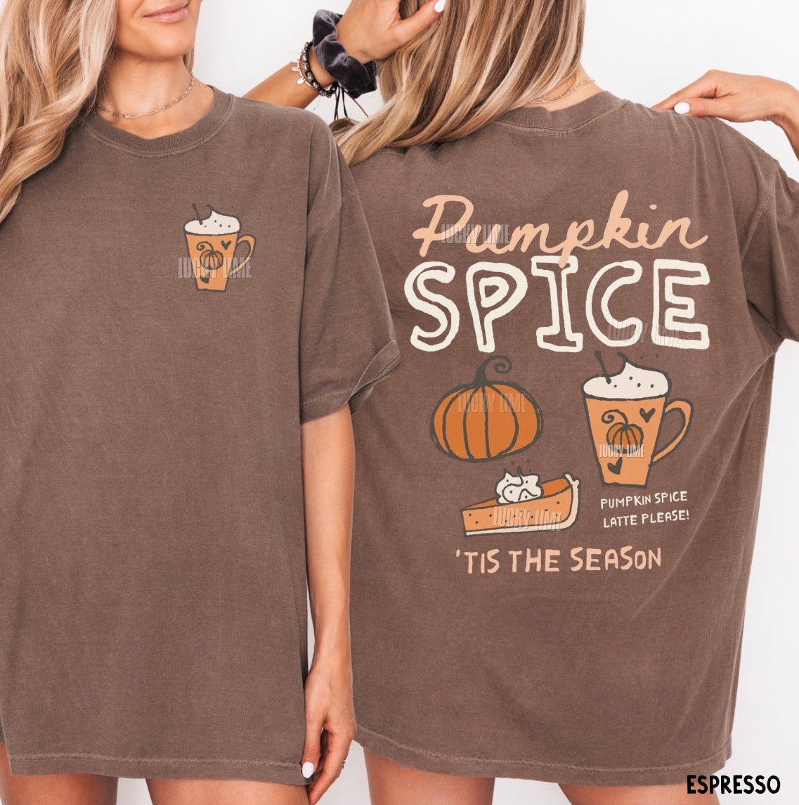 Two models wearing an oversized brown graphic T-shirt shown from the front and back. The shirt features a small pumpkin coffee graphic on the front left chest and a large 'Pumpkin Spice' design with a pumpkin, latte, and fall treat illustration on the back.
