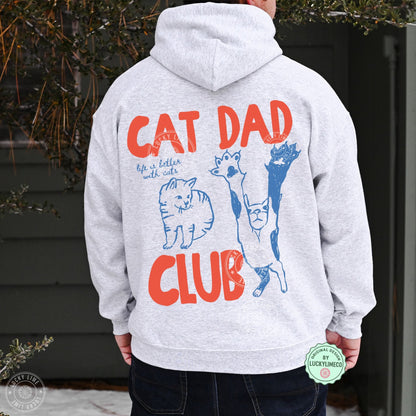 Person wearing a gray hoodie with 'Cat Dad Club' text and graphics on the back.